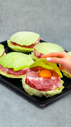 Cookrate on Instagram: "This meat and cabbage recipe will make any cook envious! Ingredients: cabbage: 1 pc yolks: 4 pc lemon juice: 20 ml (0.7 fl oz) melted butter: 50 g (1.8 oz) sweet paprika: 4 g (0.1 oz) milk: 200 ml (6.8 fl oz) pork neck: 1.5 kg (3 lb) onion: 3 pc sweet paprika: 5 g (0.2 oz) boiled eggs: 2 pc cheese: 200 g (7.1 oz) parsley: 10 g (0.4 oz) mayonnaise: 100 g (3.5 oz) mushrooms: 250 g (8.8 oz) tomatoes: 2 pc"