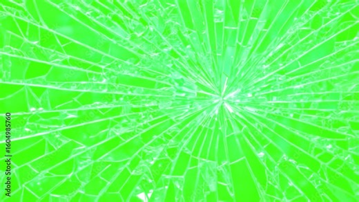 Glass Shattered and Breaks by Bullet Hit, Super Slow Motion Shot of Real Glass Break. The glass break green screen background. footage of broken glass, with green screen in the background.