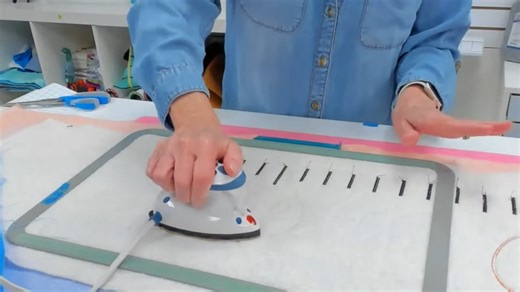 Tuesday Tip! Hoop 'n Press Pads for Snap Hoop Monster stabilize your hoop while providing a pressing surface to ensure smooth, professional embroidery. Watch as Eileen demonstrates how pressing a raw edge appliqué before adding the satin stitch helps prevent snow plowing, keeping edges crisp and clean, even on stretchy fabrics like knits. #TuesdayTip #MachineEmbroidery #EmbroideryTips #InTheHoop | DIME by OESD