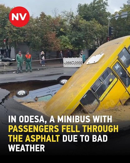 12K views · 423 reactions |  Heavy rains in Odesa caused disaster: a bus and minivan collapsed into a massive sinkhole in the road. Both vehicles were later lifted out, but the flood has claimed nine lives, including a child. The city received about 1.5 months’ worth of rain in a single day, flooding homes, basements, and streets. Over 23,700 people lost power across the region. | The New Voice of Ukraine | Facebook