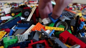 Download Colorful children's toys and legos, colorful lego pieces to combine pieces to create structures, selective focus for free