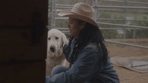 clip-3469237617-woman-dog-farm-during-daytime