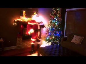 Santa Claus caught on hidden camera taking a cookie break! He really is real!