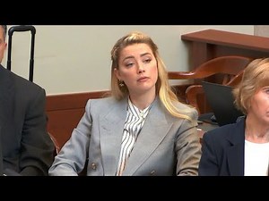 Meet One of Amber Heard’s Lone Fans