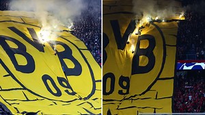 Watch as Dortmund tifo is set alight after 'flares held through it' in PSG game