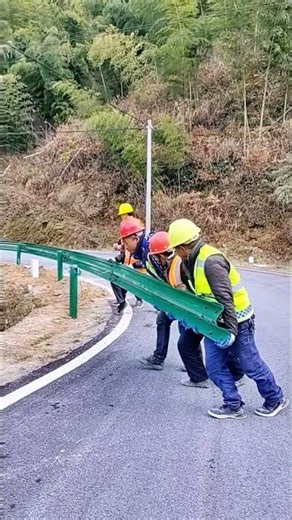 Install metal guardrails along the road