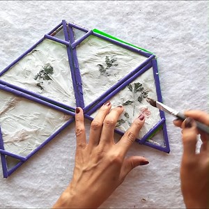 Let's make a paper hanging lamp today. All we used in this lamp is paper, dried as well as fresh leaves and some paper flowers. | Design Decor & Disha