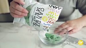 Top mini chocolate cupcakes with these cute candy trees. Made in different shades of Candy Melts candy, these Mini Candy Tree Cupcakes are a fun and colorful addition to your Christmas! Click here for the written instructions: http://ow.ly/ytVl50xzDtj | Wilton Cake Decorating