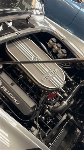 Jonathan Motorcars on Instagram: "Start up on the 427‼️1965 @backdraft_racing Cobra 🐍 Grigio Silverstone / Black Stripes / @prestige_moto 500HP / For Sale! #JMCCobra #shelby #cobra JMC is your Official Backdraft Racing Dealer! ☎️609-871-2700 💻JMCCobra.com"