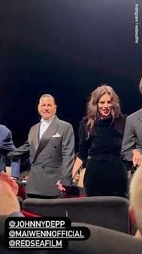 Johnny Depp cries during seven-minute standing ovation