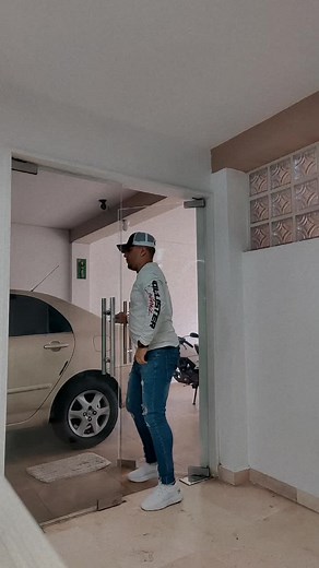 Dance Moves in a Garage Setting with Anuel's Music