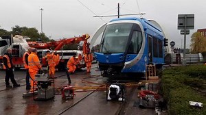 32K views · 209 reactions | Engineers work on a tram involved in a collision with a car on Bilston Street island, Wolverhampton, on Tuesday (October 8​). | Express & Star | Facebook