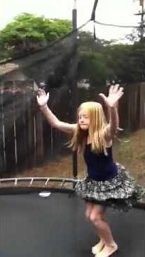 6 year old doing gymnastics on trampoline