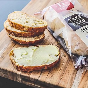 3.5K views · 278 reactions | Our Take & Bake Garlic Loaf is rich, soft, and aromatic. Baked with roasted garlic for a perfectly moist and savory flavor. Now available at a Meijer store near you! | La Brea Bakery | Facebook