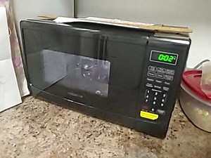 Farberware Compact Countertop Microwave Oven, 0.7 Cu. Ft. 700-Watt with LED Lighting, Child Lock, Ea