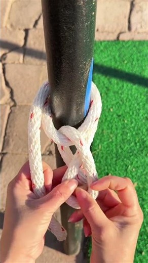 Double loop fixing knot with even force distribution and firmness