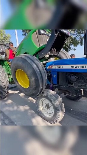 Nishu deshwal John deer vs new holland tractor ki stunts #youtubeshorts #jattlife