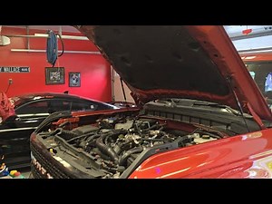 Installation of the Ford performance hood struts.