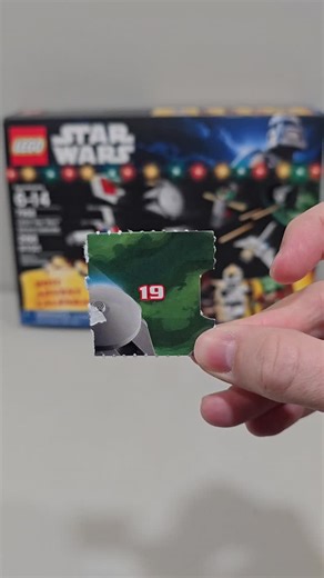 Zachary Masciantonio on Instagram: "On the 19th day of Christmas... of the original Lego Star Wars Advent Calendar set 7958... from 2011... we open and build a TIE Fighter Pilot minifigure! This minifigure was also available in the TIE Defender set 8087. We are accustomed to more detailed and better TIE Pilot minifigures these days. This minifigure definitely has a nostalgic feeling to it. I do like the helmet. The head piece is all black. The legs do not have any printing. A minifigure day in a