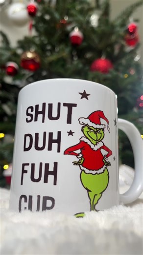 Get ready to grin with our Grinch mug! 😁🎅 The 'Shut Duh Fuh Cup' quote adds a dash of humor to your morning routine. Perfect Christmas Gift 🎁🎄 #grinch #grinchtok #grinchmas #grinchtok #christmastree #grinchcup #grinchmug #funnymug #secretsanta #secretsantagift