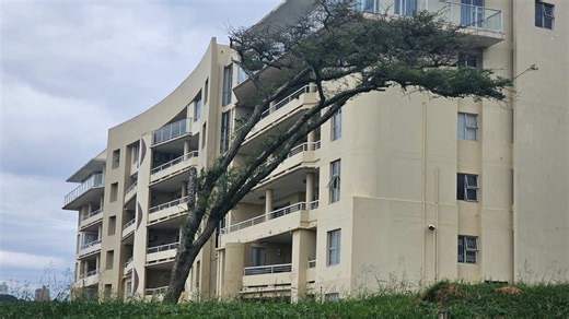 R2 100 000.00 - Ultra-Modern Riverside Apartment – Spacious Lock-Up-and-Go Living Discover contemporary living in this stylish and generously sized one-bedroom apartment set in the sought-after Riverside precinct of Durban North. Designed for comfort and convenience, this beautifully presented home offers the perfect blend of modern finishes, secure living and lifestyle appeal. Step into a light-filled open-plan lounge and dining area that flows seamlessly into a fully fitted designer kitchen — 