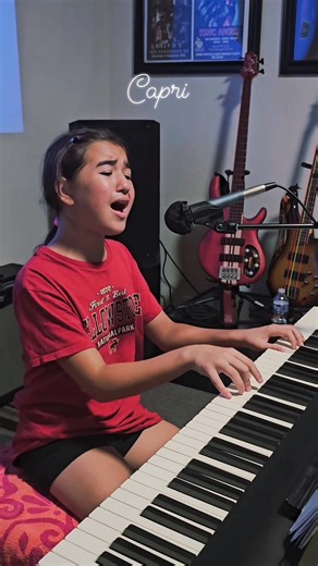 She successfully multitasked by singing and playing the piano at the same time, which looked like a blast! Bill Swisher Jey Swisher Michael Angelo Lagat Codilla | Capri Swisher