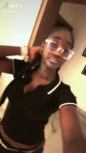 Purity Okojie in Stylish Glasses and Braids
