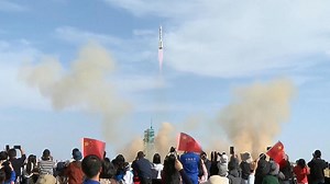 China has launched three astronauts into space after a ceremony in the country's Gobi desert.
