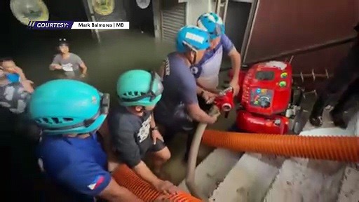 MDRRMO use siphoning equipment to drain floodwaters in Manila