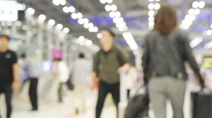 Download Slow motion blur people or tourist or passenger walking at airport terminal for free