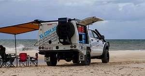 Rebel X truck canopy shifts seamlessly between work and RV adventure