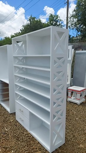 Modern Multi-Tiered White Shelving Unit Design