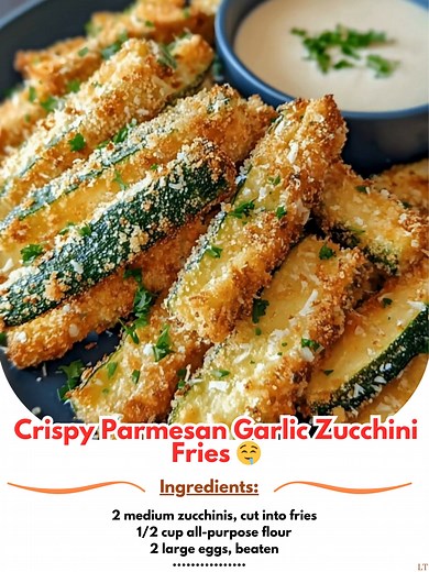Crispy 🛳 Parmesan Garlic Zucchini Fries 🤤 Ingredients: 2 medium zucchinis, cut into fries 1/2 cup all-purpose flour 2 large eggs, beaten 1 cup panko breadcrumbs 1/2 cup grated Parmesan cheese 1 teaspoon garlic powder 1/2 teaspoon paprika Salt and black pepper, to taste Olive oil spray 📢 | The Easy Recipes