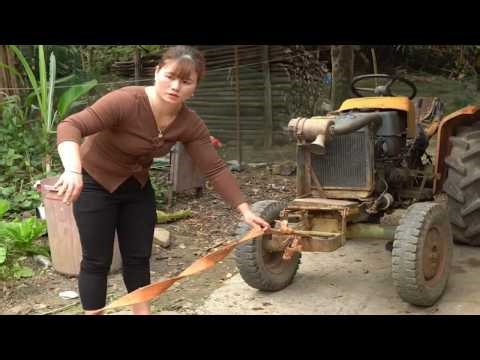 The girl shows her extraordinary dedication by repairing a broken tractor