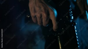 Handgun Loading: Man in Black Jacket Loads and Lifts Up a Weapon - HD Stock Video. Closeup of Hand Shooting. Danger and Protection. Straight out of the camera.