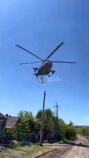 Russian Mi-8 military helicopter firing missiles & deploying flares