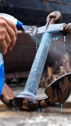 rusted iron anchor hook restoration
