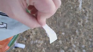 Opening the EZ Open Feed Bags