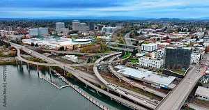 Highway and freeway road system in the modern city. Twilight scenery of Portland, Oregon, the USA. Top view.