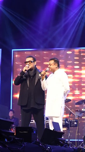 Dr. Sambit Patra on Instagram: "A memorable moment at Nimapada Mahotsav in Puri district. Shared the stage and sang a few lines of the evergreen “Main Koi Aisa Geet Gaun, Ke Aarzoo Jagaun, Agar Tum Kaho” with renowned playback singer Abhijeet Bhattacharya ji."