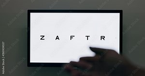 Clinic, letter and eye test, optometry and reading for vision, eyecare and healthcare with monitor. Digital, medical and words for results, hospital and screen for check up, service and technology