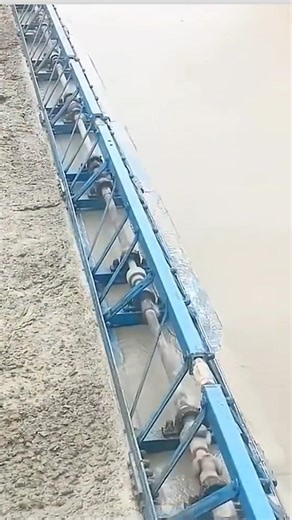 Paving a Concrete Floor with a Vibrating Beam.