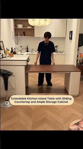 Multifunctional Extendable Kitchen Island Table with Sliding Countertop and Ample Storage Cabinet