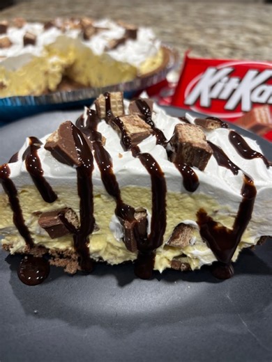 Candy Bar Dessert! Enjoy a yummy pie that's ready in a flash. A super easy dessert that has several options. Have fun switching up the candy you use or even the pudding flavor. It's great for the family or if company is coming over. #dessert #pie #chocolate #easyrecipes | Scott & Karen