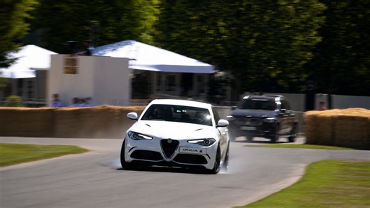 Alfa Romeo Giulia slides through a fast corner