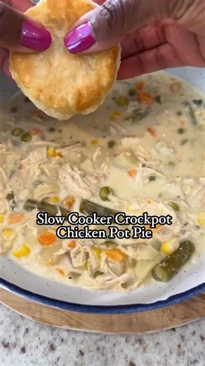 Make chicken pot pie the easy way in the Crockpot/slow cooker. Top it with warm biscuits for a cozy meal. | Stay Snatched - Easy and Indulging Recipes