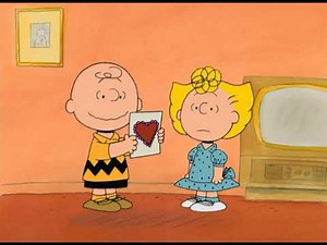 Charlie Brown Practices Giving The Little Red Haired Girl a Valentine