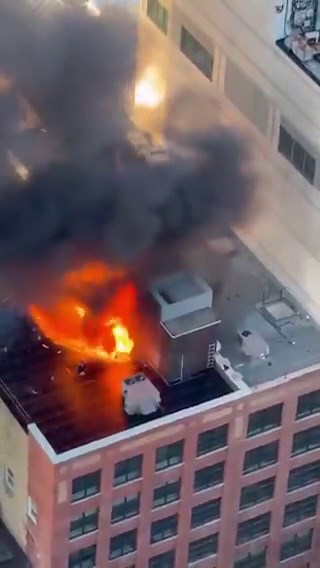 WATCH: Aerial view of the Toronto rooftop fire from a nearby high-rise.