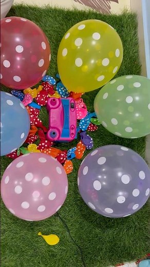 Watching Colourful Dot Balloons Inflate with Electric Balloon Machine