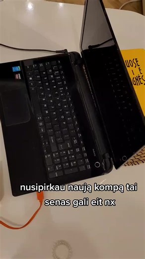 Exploring a Black Laptop Setup in a Cozy Room